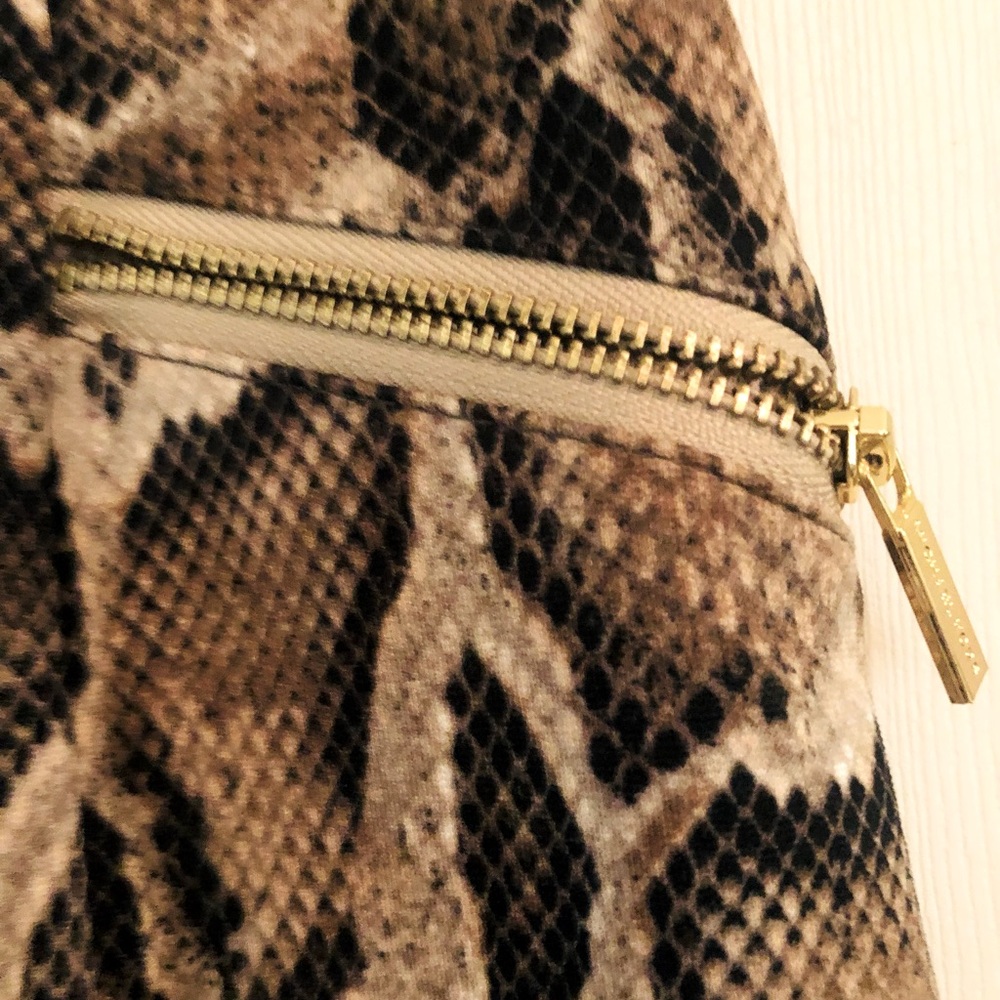 Michael Kors Python Print Skirt with Gold zipper detail.